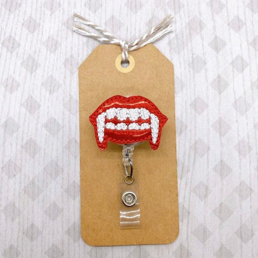 Fangs Badge Topper