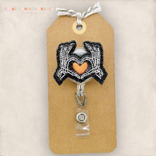 Skeleton Hands Heart Badge Topper