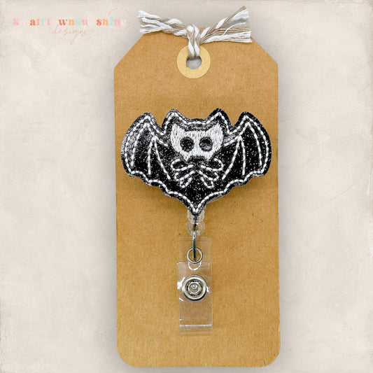 Skeleton Bat Badge Topper