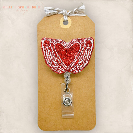Skeleton Hands Heart Badge Topper
