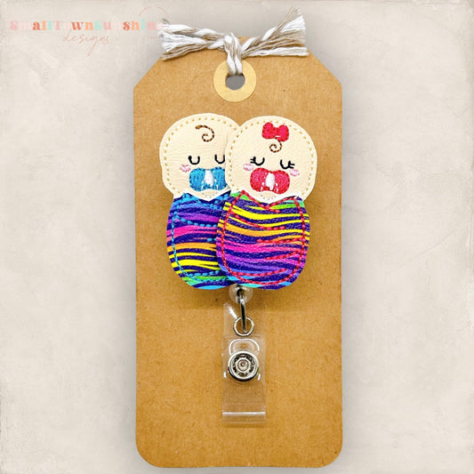 Colorful Swaddled Babies Badge Topper