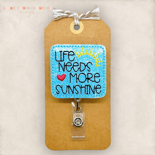 life needs more sunshine embroidered badge reel