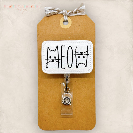meow with cat faces badge reel