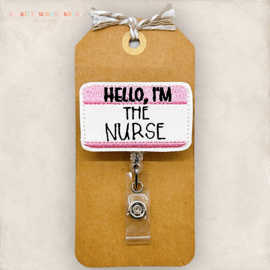 hello I&#39;m the nurse pink name tag badge reel