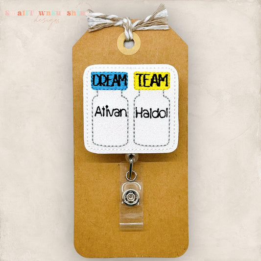 dream team, medicine bottles badge reel