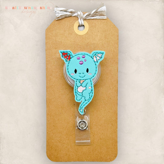 teal dragon badge reel
