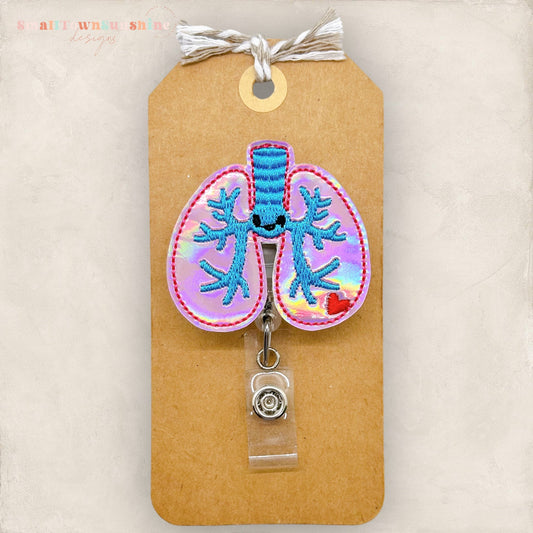 kawaii holographic pink lungs badge reel
