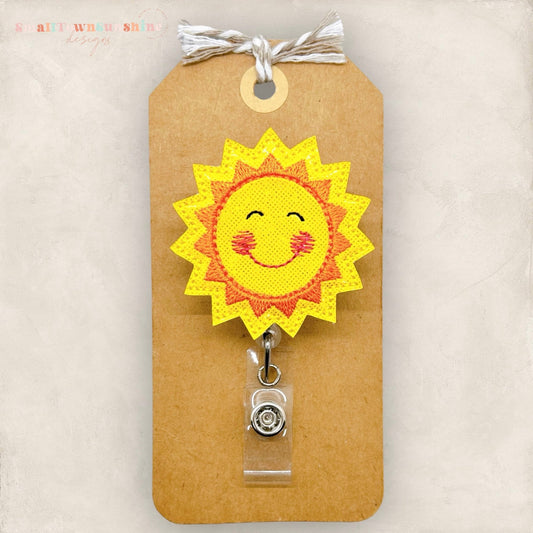 happy sun embroidered badge reel