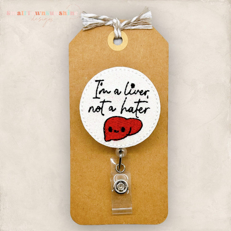 organ humor badge reel