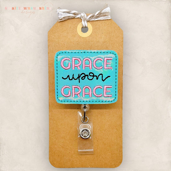 grace upon grace embroidered badge reel