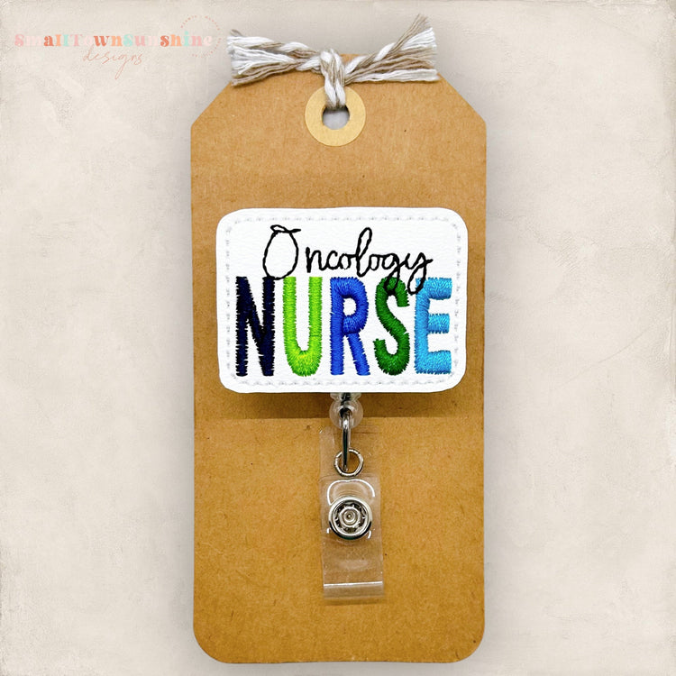 oncology nurse badge reel in masculine colors