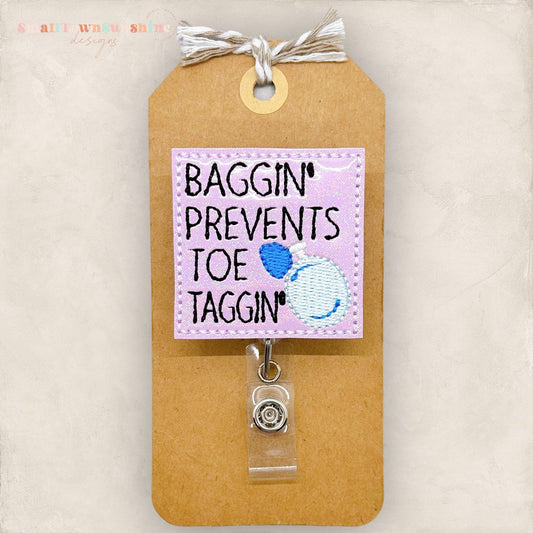 Baggin Prevents Toe Taggin Badge Topper