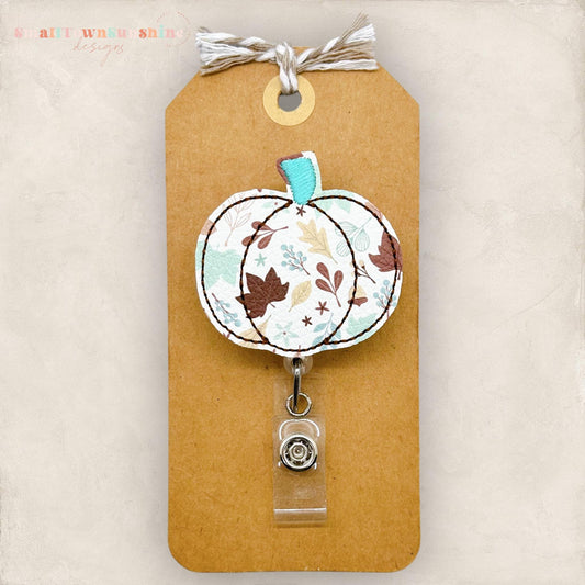 fall leaf print, teal and brown leaves pumpkin badge reel