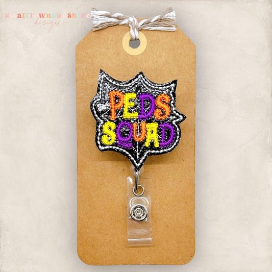peds squad spiderweb halloween badge reel