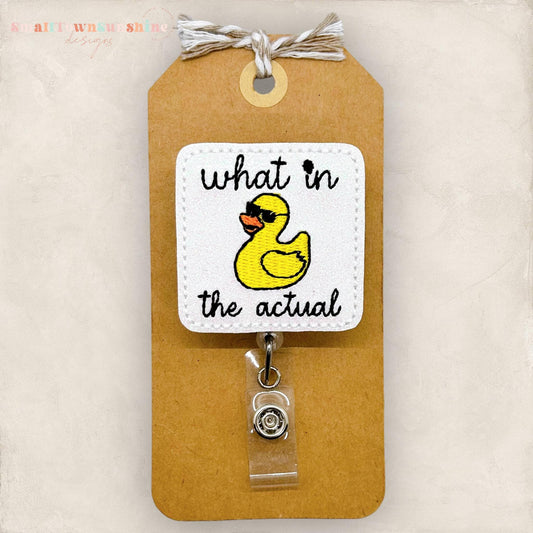 what in the actual duck with sunglasses badge reel