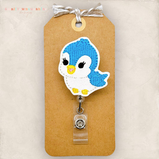 embroidered blue bird badge reel