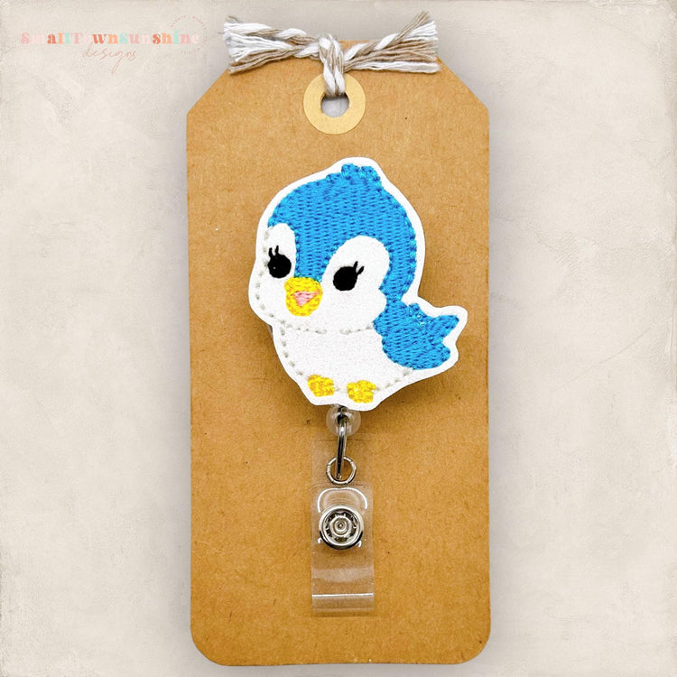 embroidered blue bird badge reel
