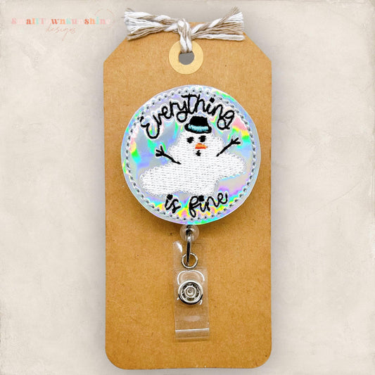 funny melting snowman embroidered badge reel