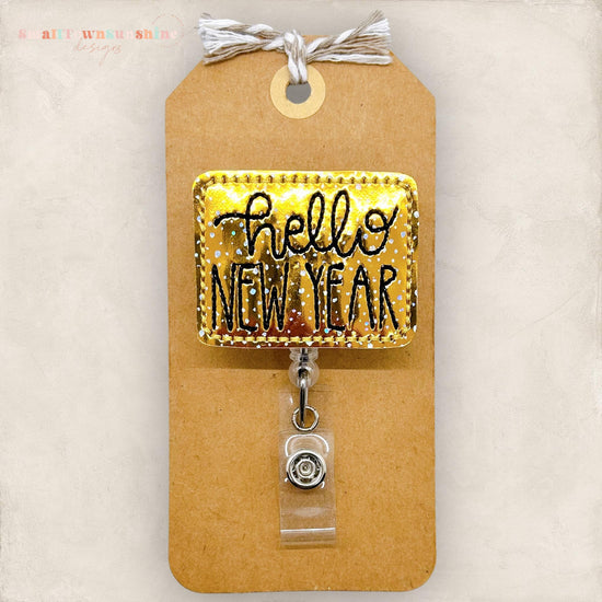 gold hello new year embroidered badge reel