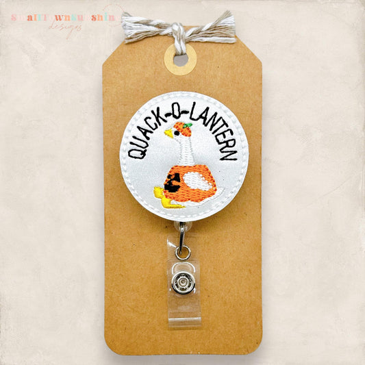 silvery quack o lantern embroidered badge reel