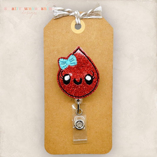 cute blood drop with bow badge reel
