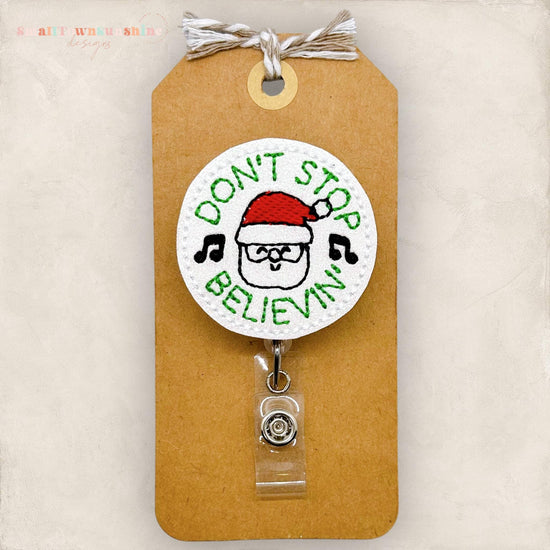 don&#39;t stop believing in santa embroidered badge reel