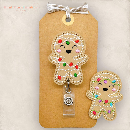 christmas lights wrapped around a gingerbread cookie badge reel