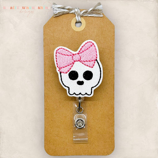 embroidered halloween skull with big pink bow badge topper