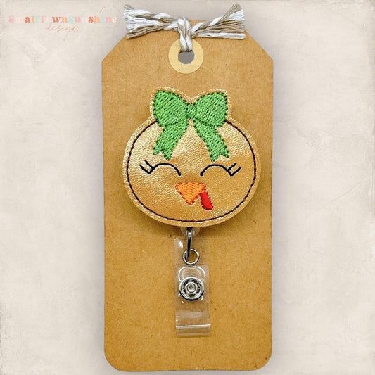 cute turkey face with green bow embroidered badge reel topper
