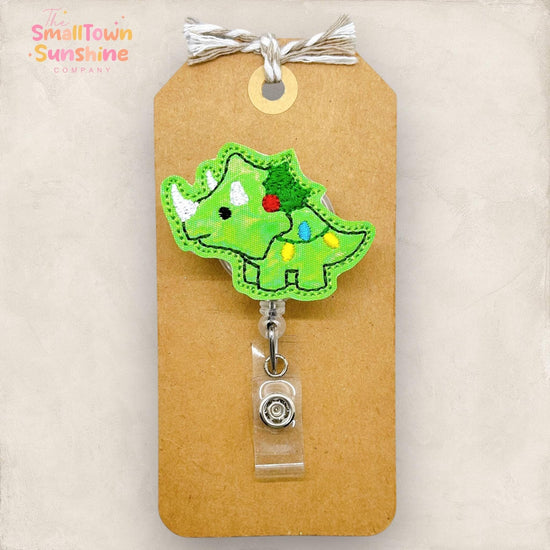 green christmas triceratops embroidered badge reel topper
