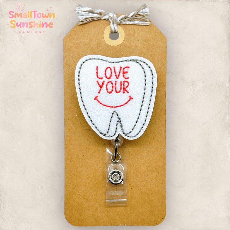 embroidered tooth with love you smile embroidered badge reel topper