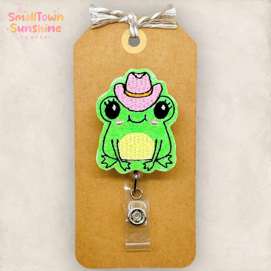girlie green frog with pink cowboy hat embroidered badge reel topper
