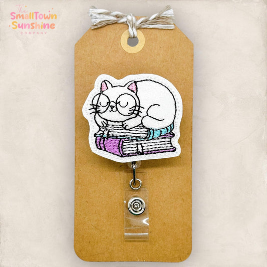 White Cat on Books Badge Topper
