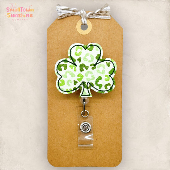 green leopard printed clover badge reel topper
