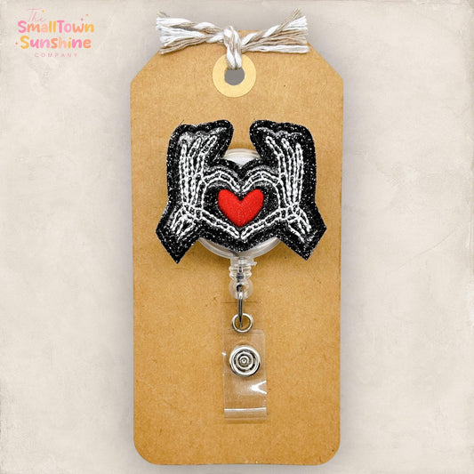 Skeleton Hand Heart Badge Topper