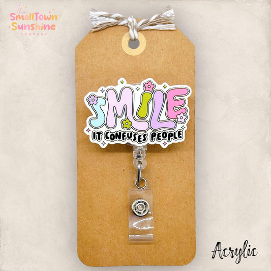 Smile It Confuses People Badge Topper