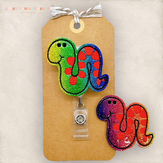 colorful rainbow glitter snake badge reel