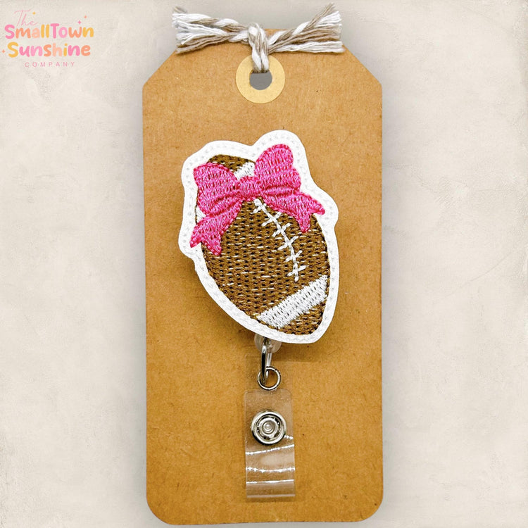 Football with Pink Bow Badge Reel, Coach Name Tag, PE Teacher Lanyard, Nurse Badge Clip, Coworker Gift, Retractable ID Holder | GLITTER