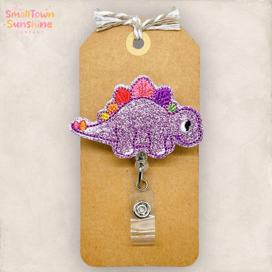 Purple Dinosaur Retractable Badge Reel: Stegosaurus ID Holder, Name Tag, Topper, Coworker Gift, Lanyard, MRI Safe, Heavy Duty | GLITTER