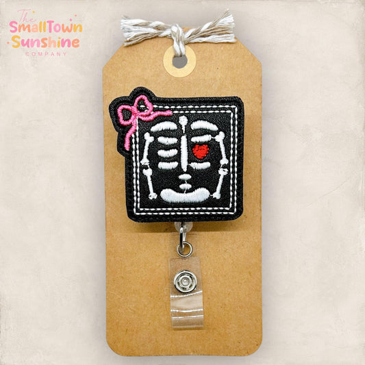 Framed Skeleton with Bow Retractable Badge Reel: Xray Tech ID Holder, Name Tag, Topper, Coworker Gift, Lanyard, MRI Safe, Heavy Duty Options