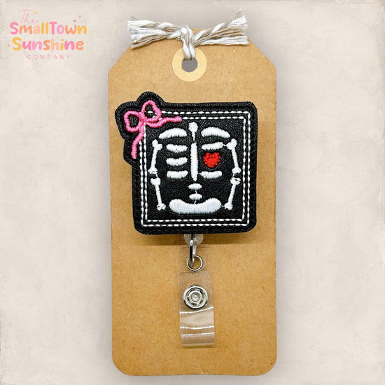 Framed Skeleton with Bow Retractable Badge Reel: Xray Tech ID Holder, Name Tag, Topper, Coworker Gift, Lanyard, MRI Safe, Heavy Duty Options