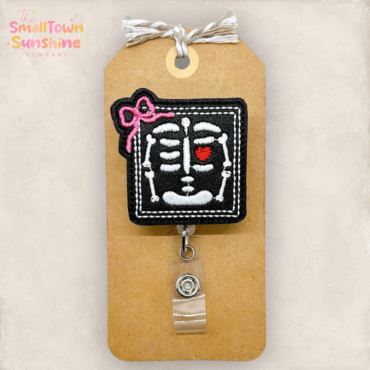 Framed Skeleton with Bow Retractable Badge Reel: Xray Tech ID Holder, Name Tag, Topper, Coworker Gift, Lanyard, MRI Safe, Heavy Duty Options
