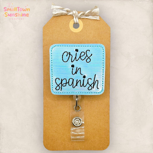 Cries in Spanish Retractable Badge Reel: Funny ID Holder, Name Tag, Swappable Topper, Coworker Gift, MRI Safe, Heavy Duty Options